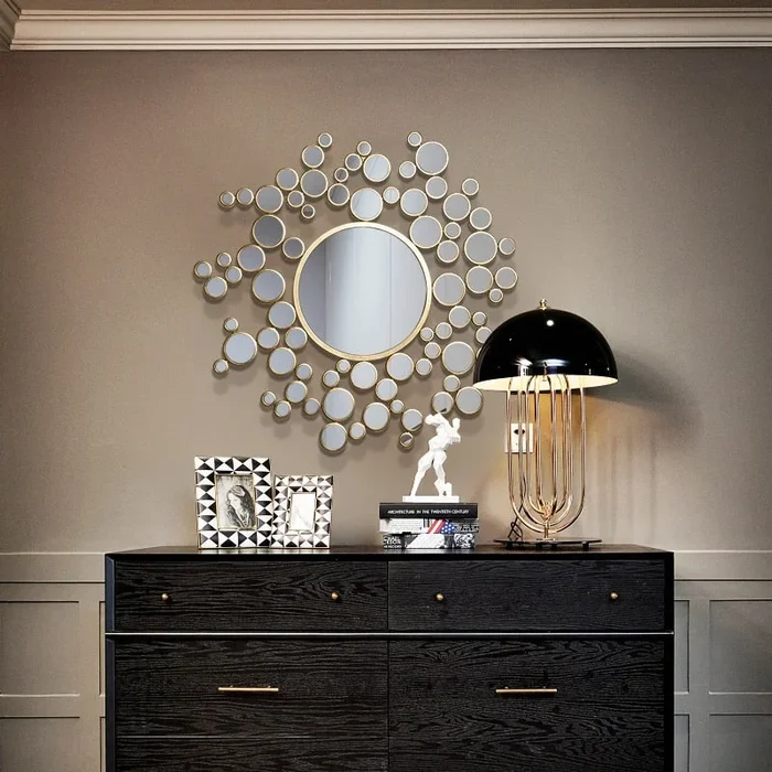 Elegant Golden Round Mirror – Abstract Decorative Design